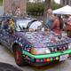 Illustration for article titled Groovalicious Purple Princess Of Peace Art Car Falls On Hard Times, Faces Crusher